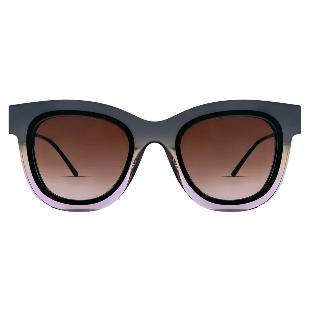 Cat-eye sunglasses with a translucent dark gray and lavender gradient frame and brown gradient lenses, thierry lasry