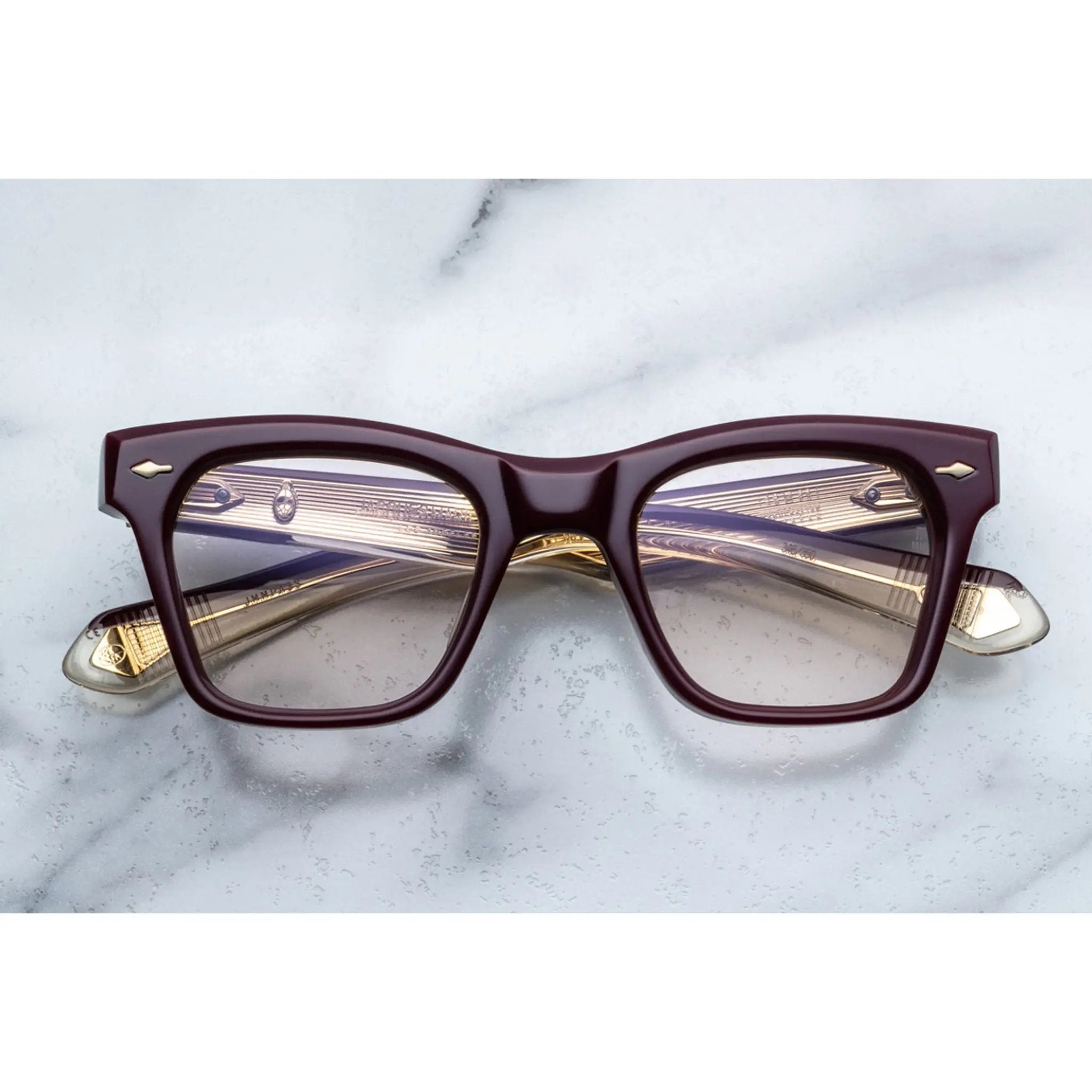 red color optical frame with gold details