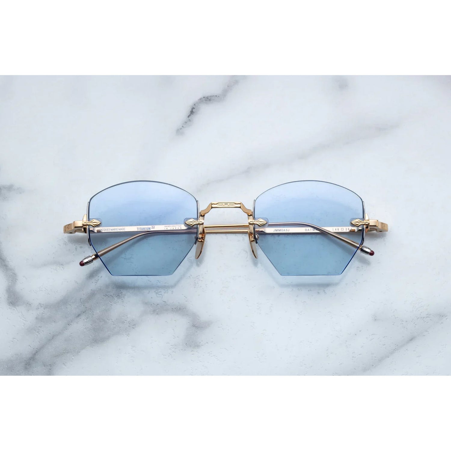 rimless sunglasses with gold details