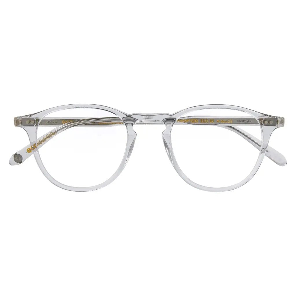 Clear eyeglasses with gold accents on a white background