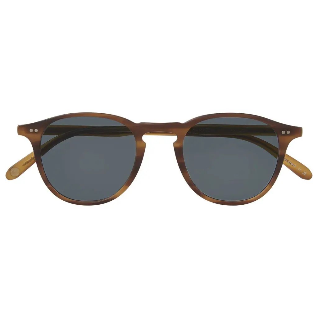 Brown sunglasses with dark lenses on a white background