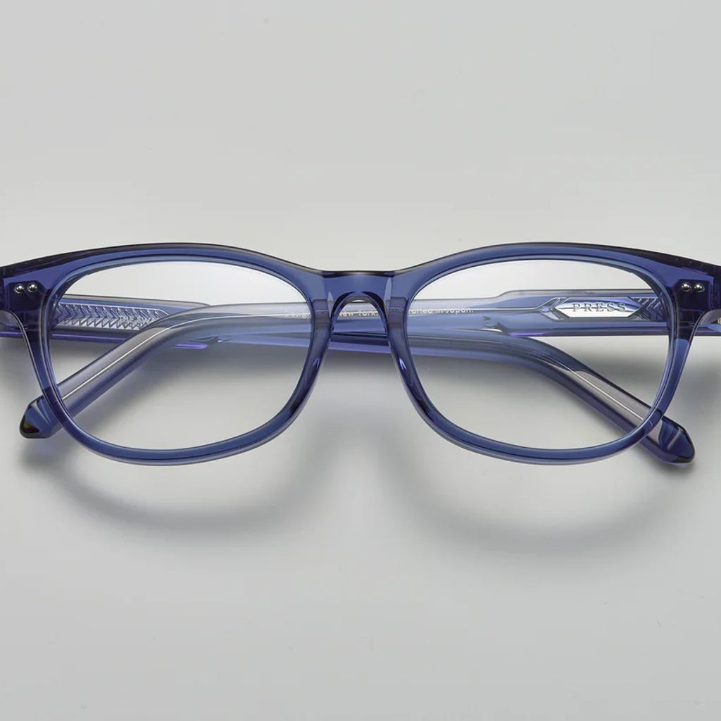 Swan blue crystal acetate eyeglasses with rectangular frames, featuring the "PRESS" logo on the temple, by Yosemite Eyewear