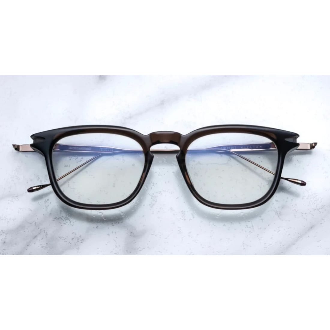 rectangular shape glasses with metal temples and engraving on them