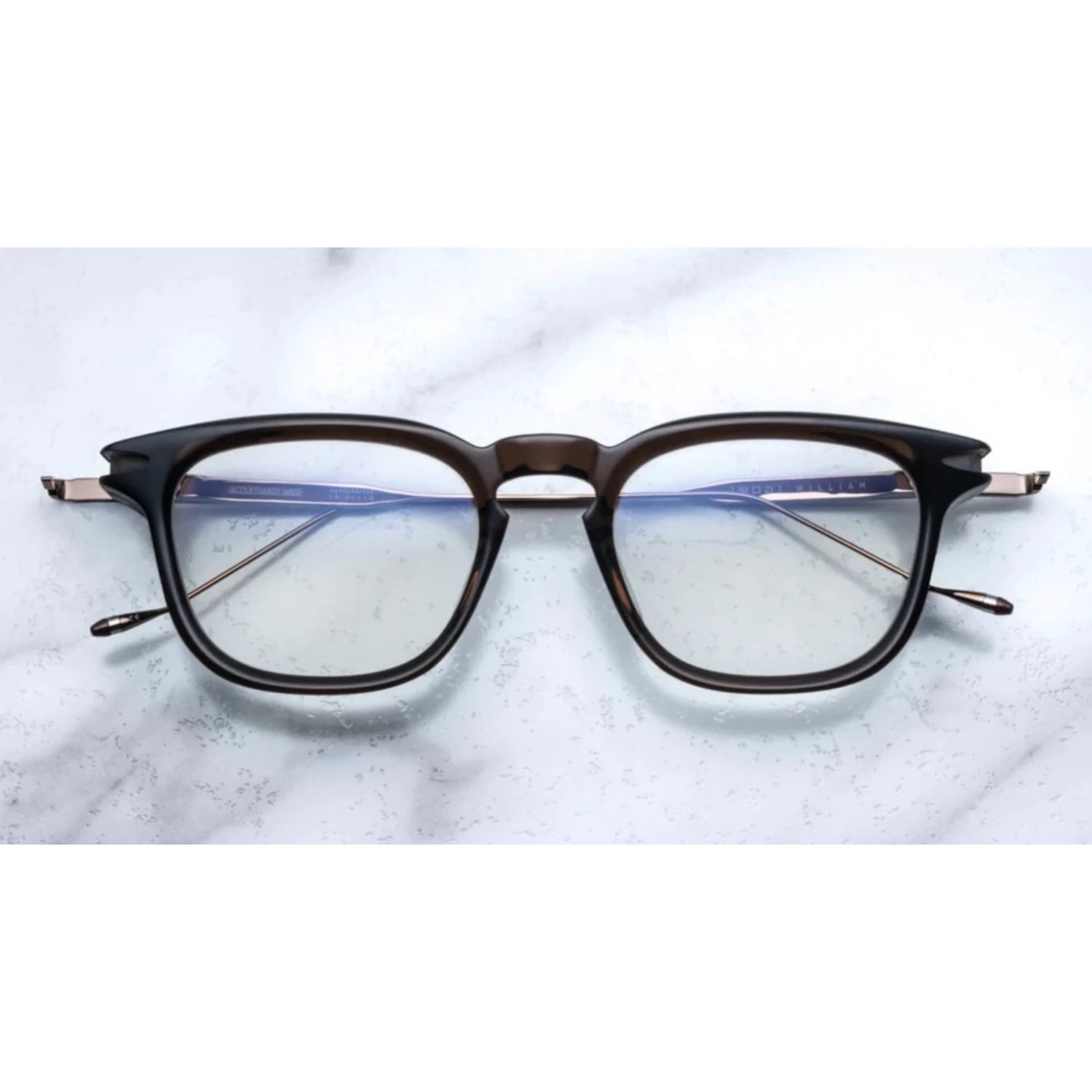 rectangular shape glasses with metal temples and engraving on them