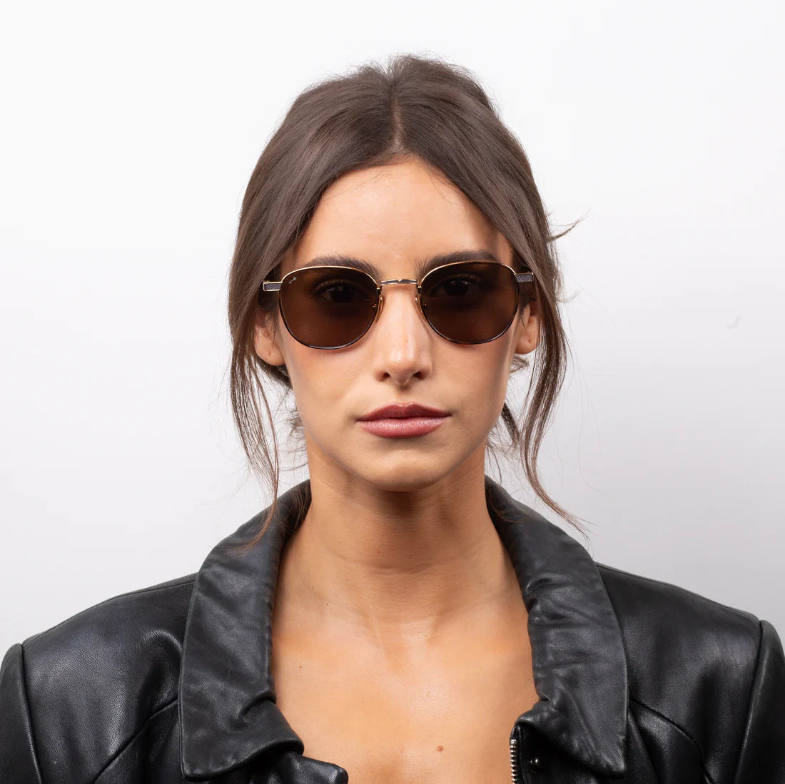 Woman wearing Leisure Society sunglasses