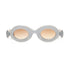 Paloceras Pebble Milky Blue RX sunglasses in milky blue with an oval frame and peach gradient lenses, front view